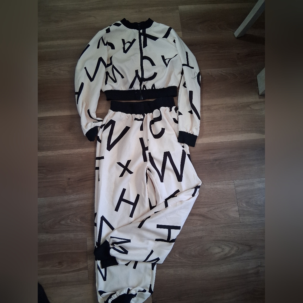 SHEIN Black and Cream Letter Print Jumpsuit